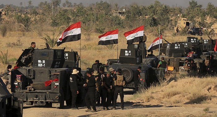 Un charnier contenant des centaines de cadavres découvert en Irak